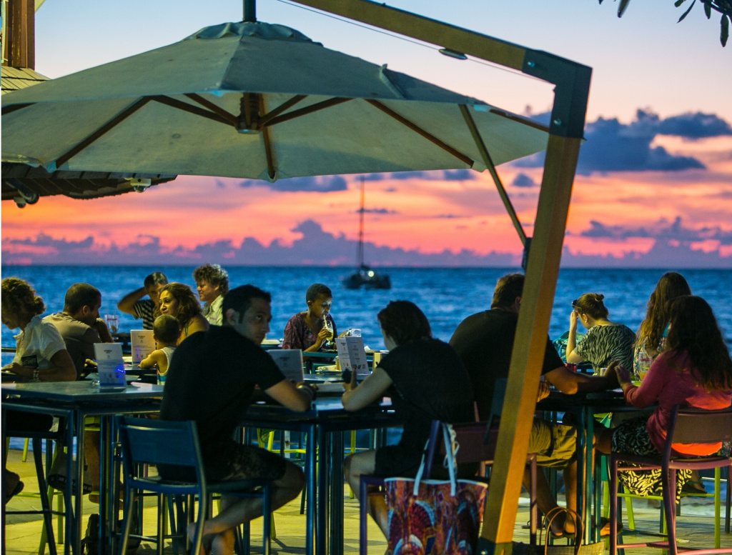 Beachfront dining with sunset views